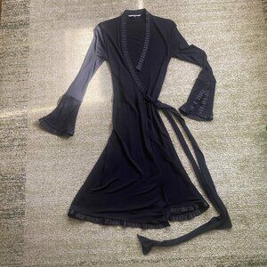 Vintage witchy black wrap dress with pleated trim
